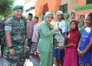 TNI Peduli, Kodim 1607/ Sumbawa Bagikan Bansos di Lokasi TMMD 116